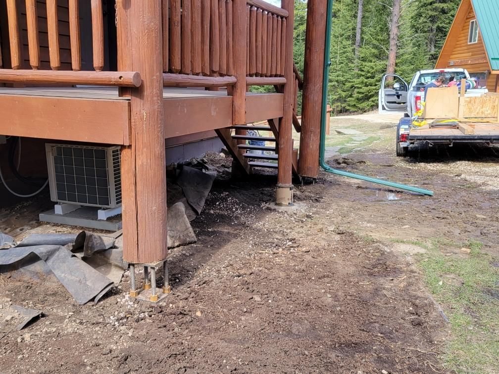 Installed concentric push pier under the main log posts