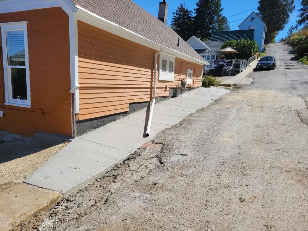 poured concrete on the side of the house