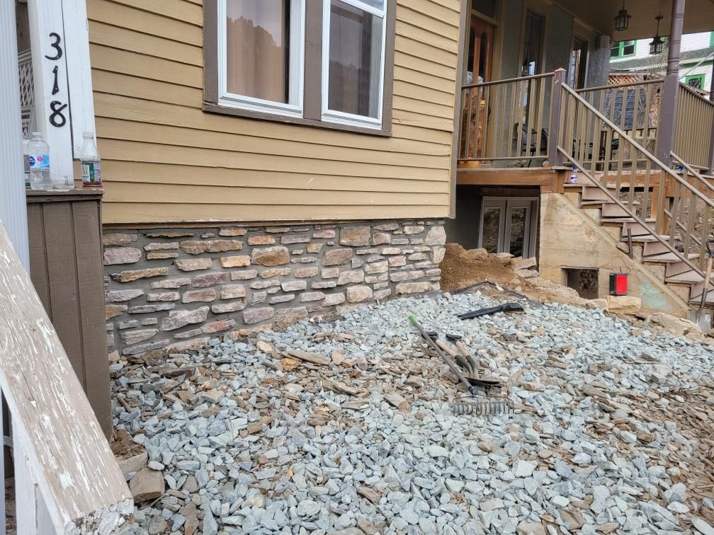 Rebuilt the old stone foundation of the house