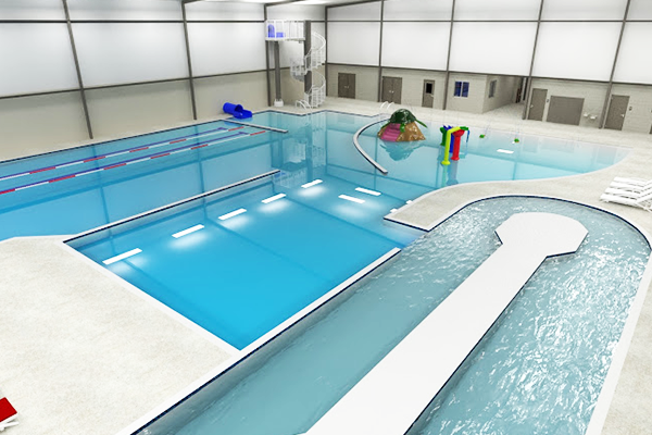 A large indoor swimming pool with a slide in the middle