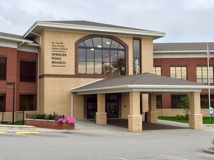 A large brick building with a sign that says spencer road branch