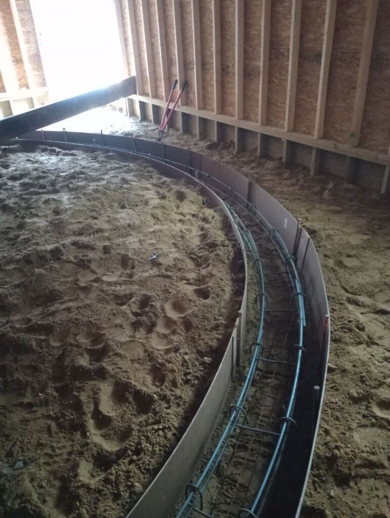 a large circular structure is being built in a building