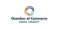 Chamber of Commerce logo for Knox County with blue text and orange-blue circular icon on white background