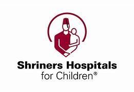 The Shriners Hospitals for Children logo, featuring a stylized figure holding a child under an arch, in dark red.