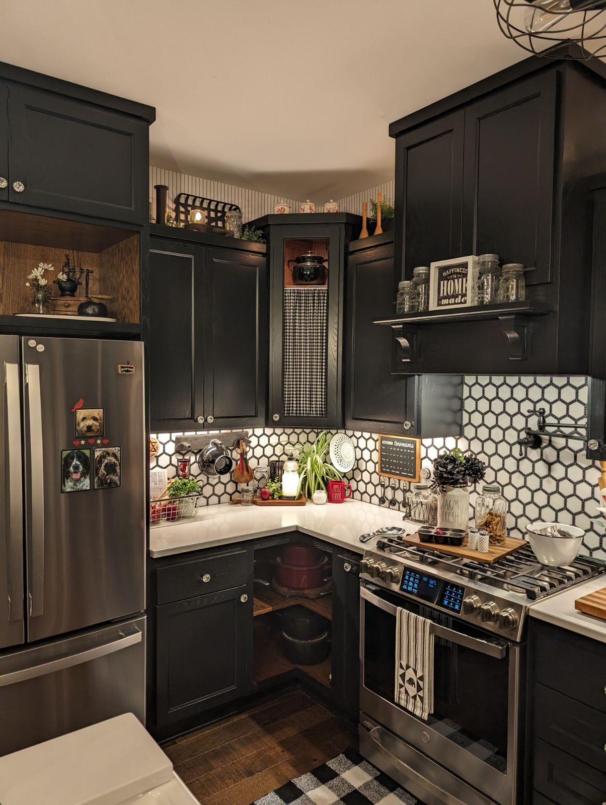 A kitchen with beautiful tiles and stainless steel appliances