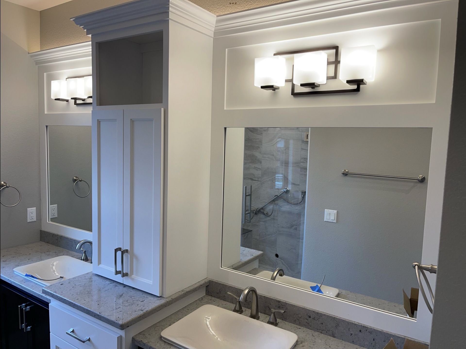Custom white bathroom cabinets