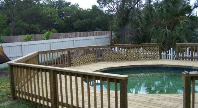 Wood Deck Around The Pool