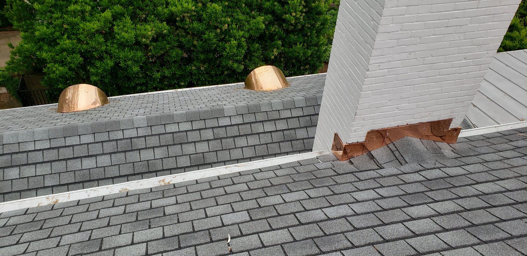 two copper window roof