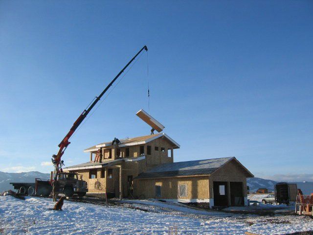 Insulated panel on crane