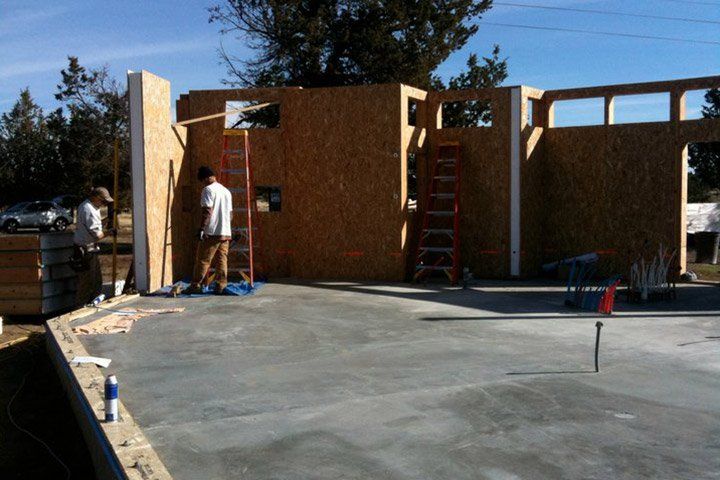 Man working on insulated panel