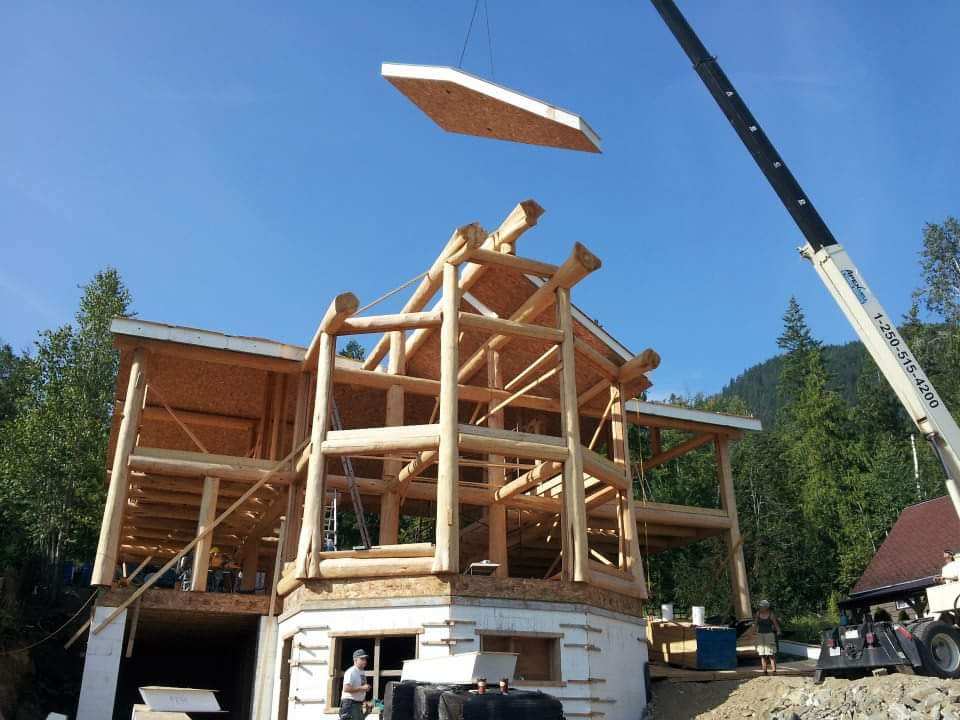 Insulated panel on crane