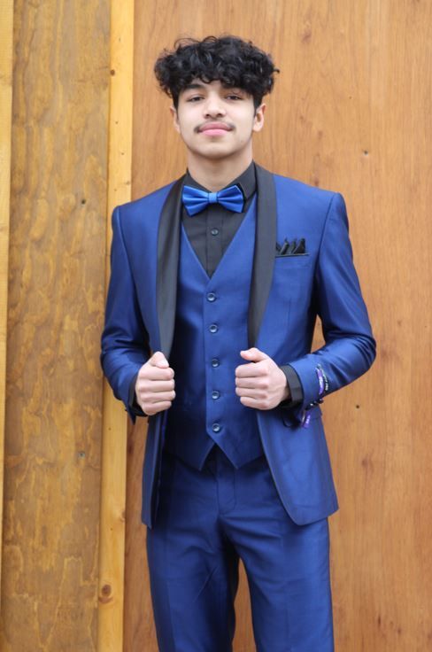 Young man in a blue suit