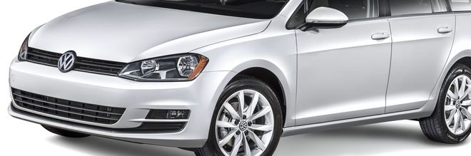A silver Volkswagen Golf station wagon parked against a white background.