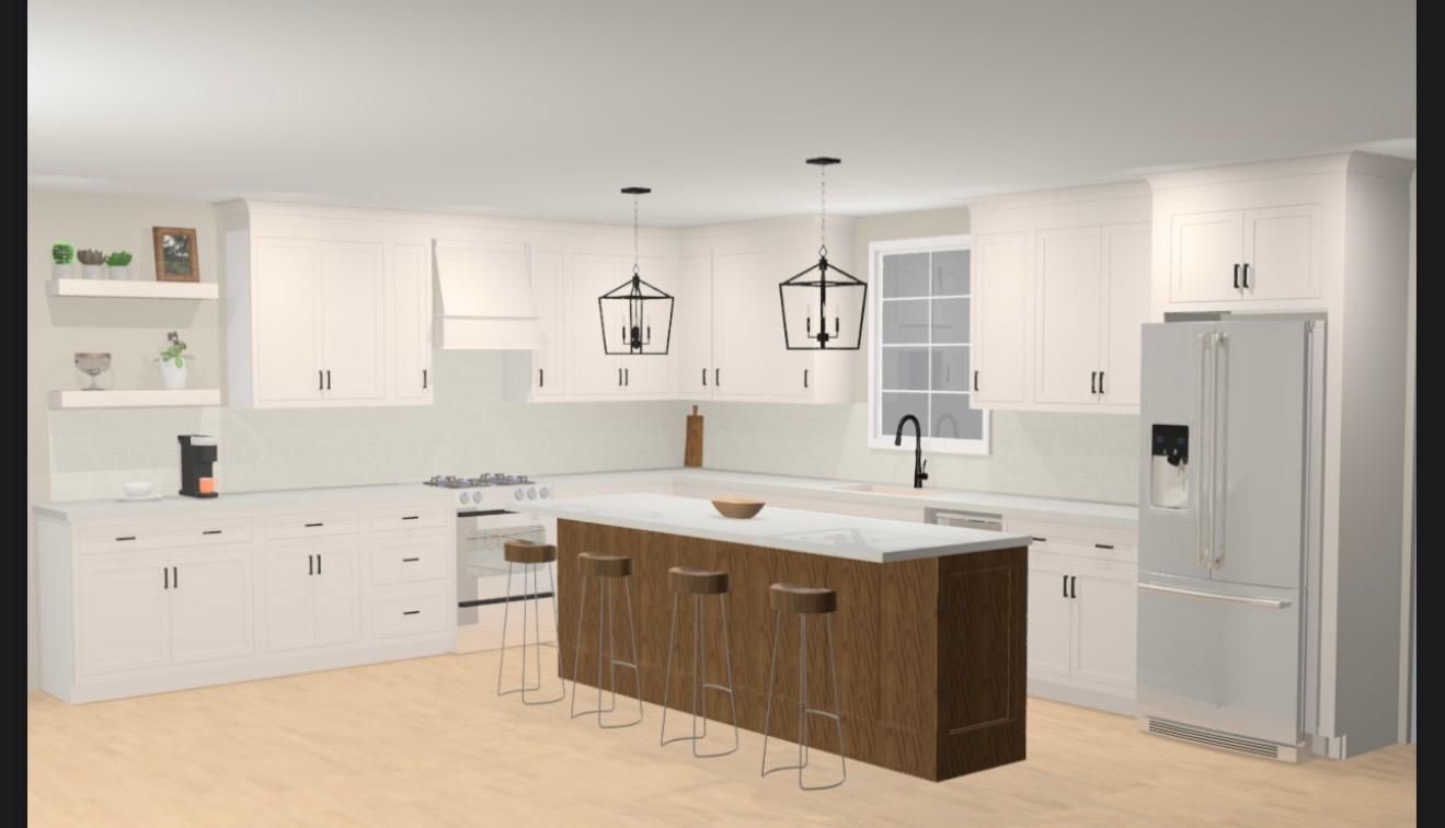 White kitchen with brown island, overhead lights, and stainless steel refrigerator.