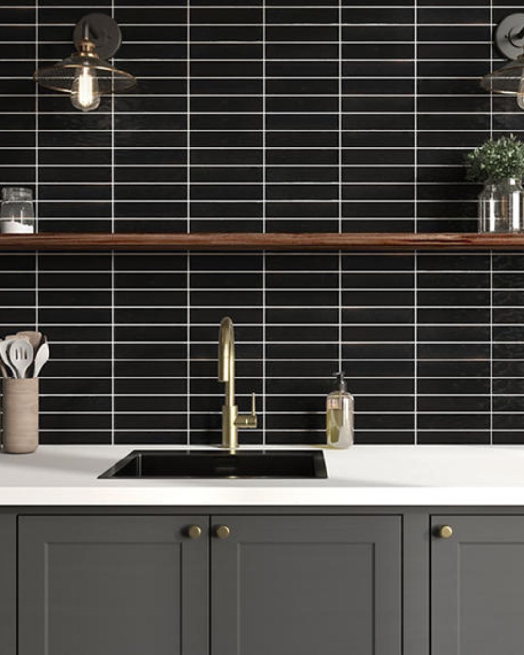 Kitchen with black tile backsplash, gold faucet, and dark cabinets.