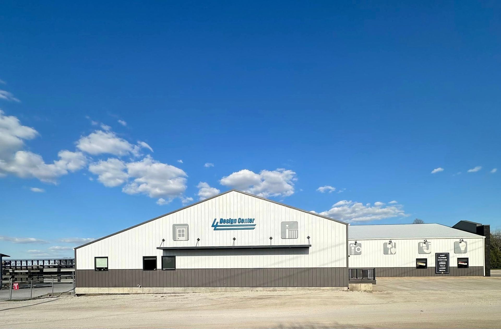 White building with a blue sign 