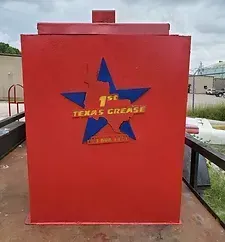Red metal box with a Texas star logo that reads