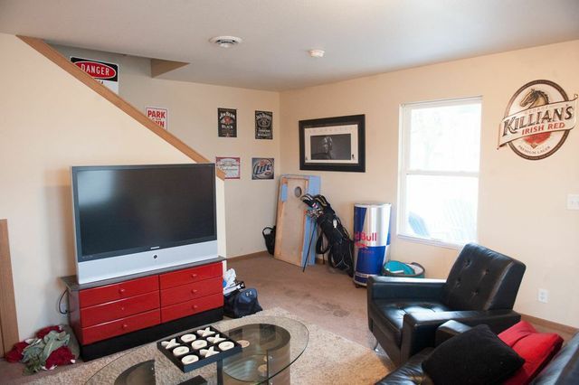 A living room with a TV.