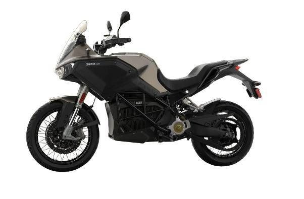 A matte tan and black Zero DSR/X electric adventure motorcycle shown from the side against a white background.
