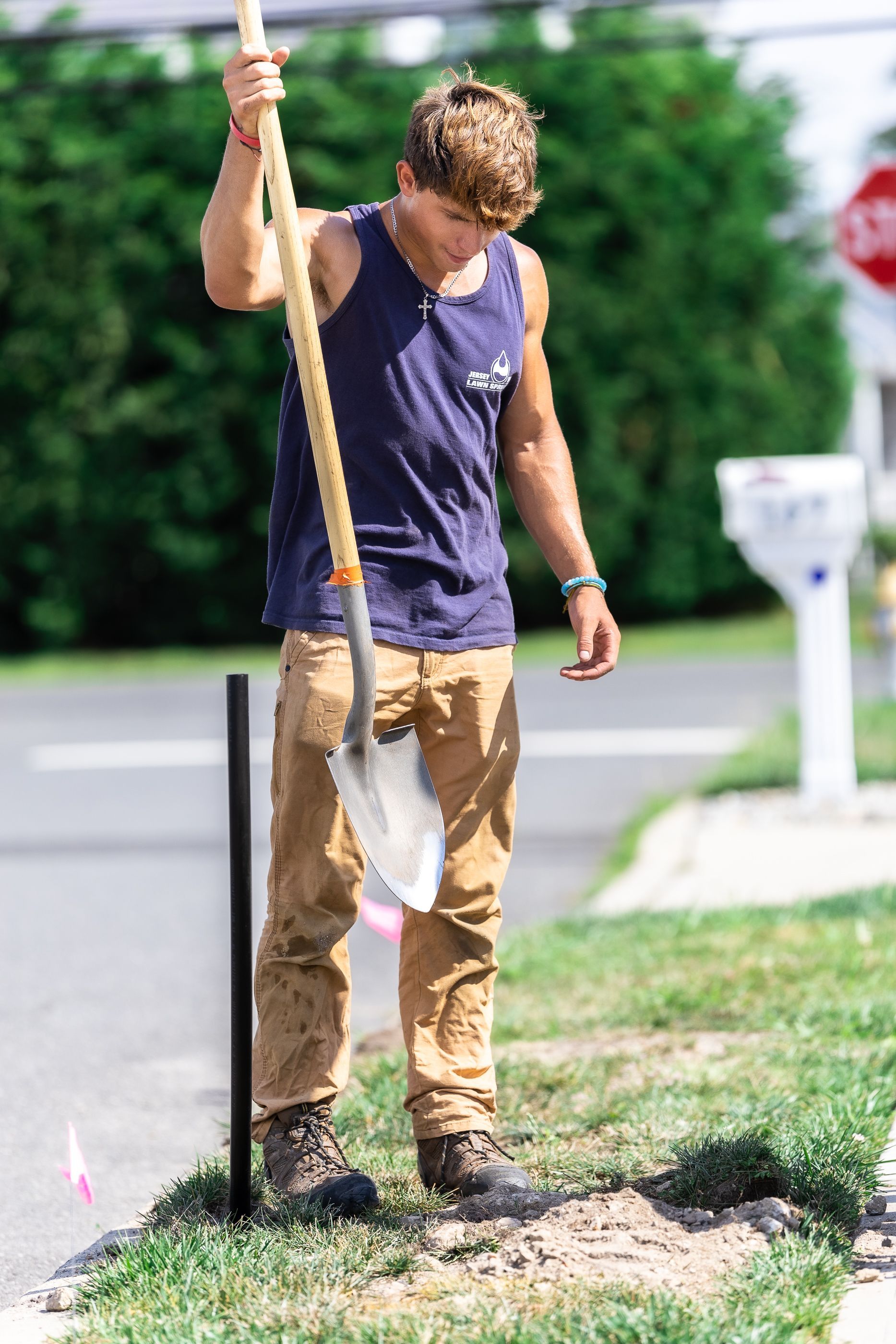 A man holding a shovel