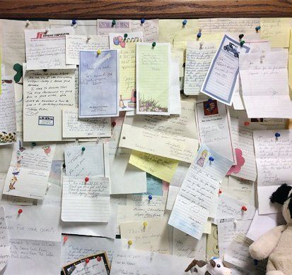 Bulletin board filled with testimonials