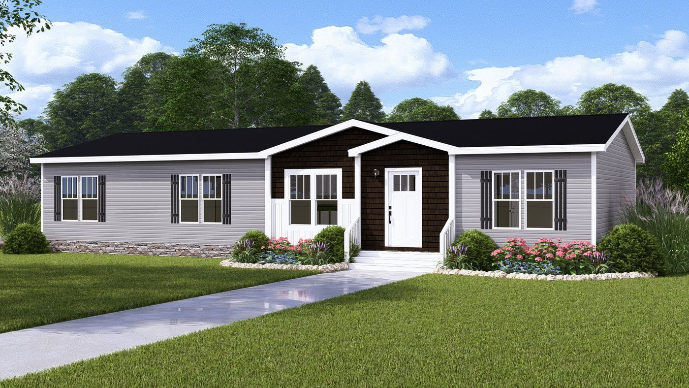 Single-story gray house with white trim and front porch, set in a green yard under a blue sky