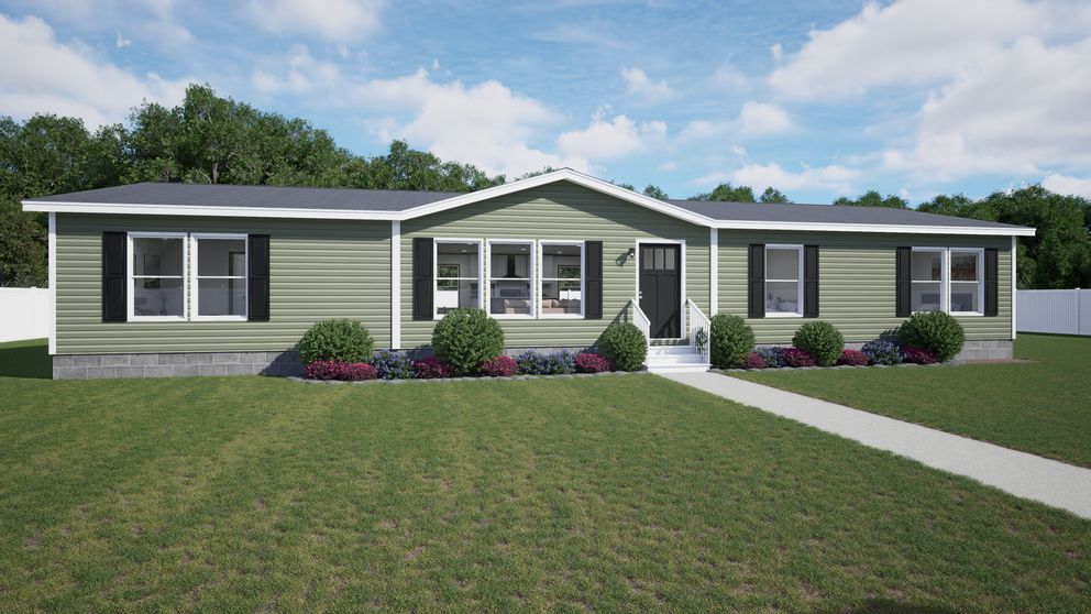Single-story gray house with white trim, front porch, and a large green lawn under a partly cloudy sky