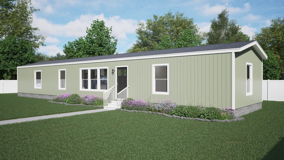Single-story beige modular home with white trim, front steps, and a small landscaped yard