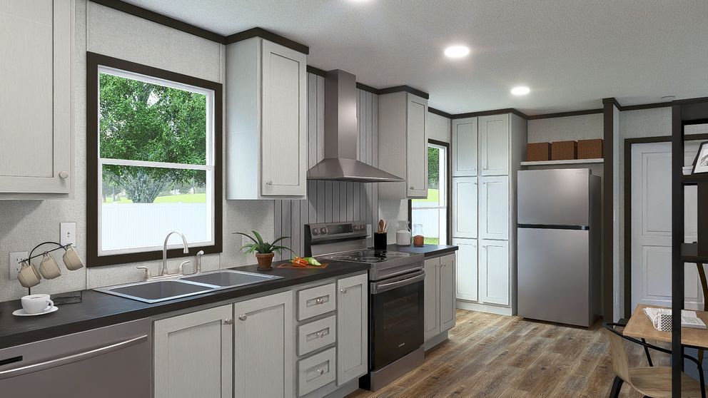 Modern kitchen with gray cabinets, stainless appliances, wood floors, and large windows