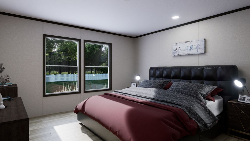 Modern bedroom with a bed, black headboard, windows, and a pool view outside