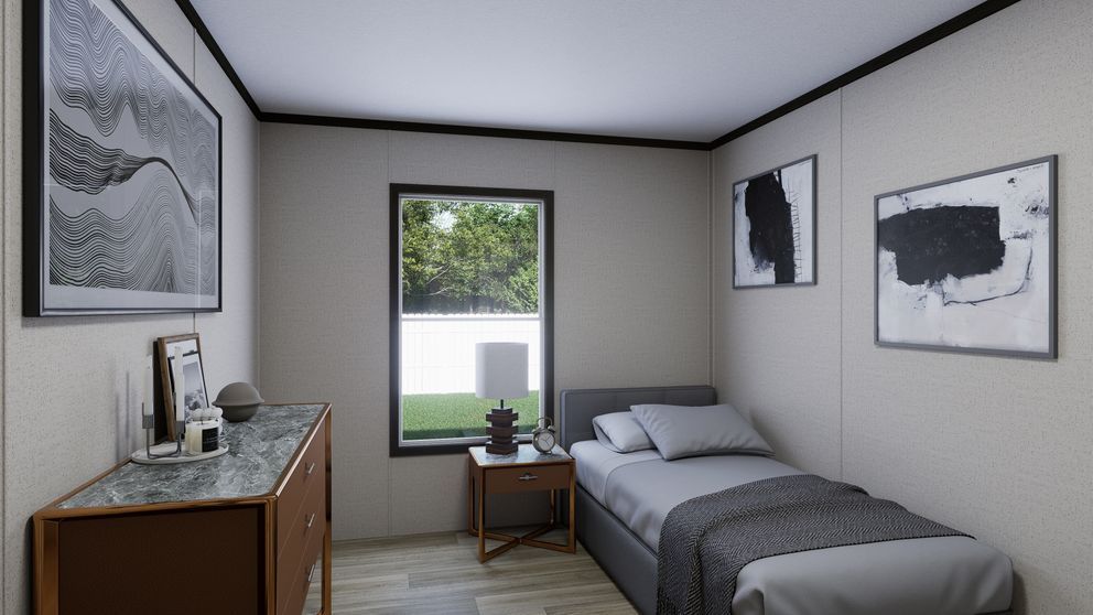 Small modern bedroom with a single bed, dresser, window, and framed wall art.