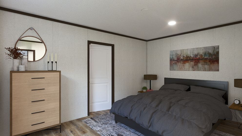 Modern bedroom with a bed, dresser, mirror, and wall art in neutral tones