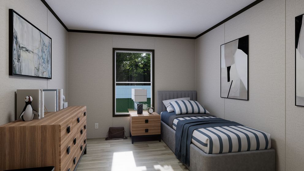 Small bedroom with a single bed, dresser, nightstand, and window letting in daylight.