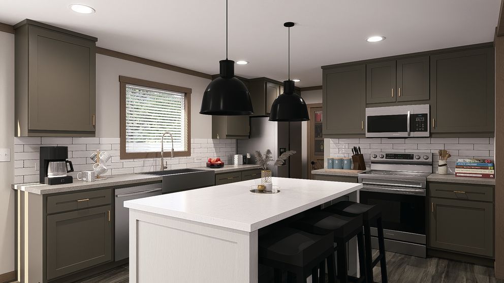 Modern kitchen with gray cabinets, white island, black pendant lights, and stainless steel appliances