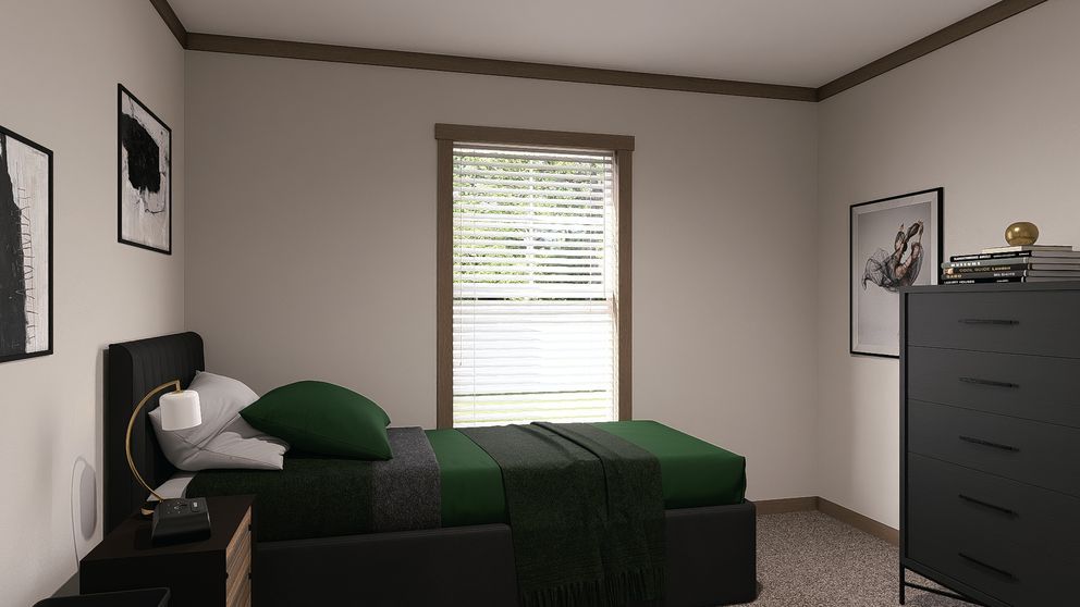 Small bedroom with a green bedspread, window blinds, wall art, and a black dresser.