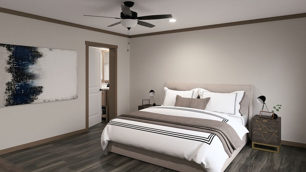 Modern bedroom with a white bed, dark wood floor, ceiling fan, nightstands, and abstract wall art.