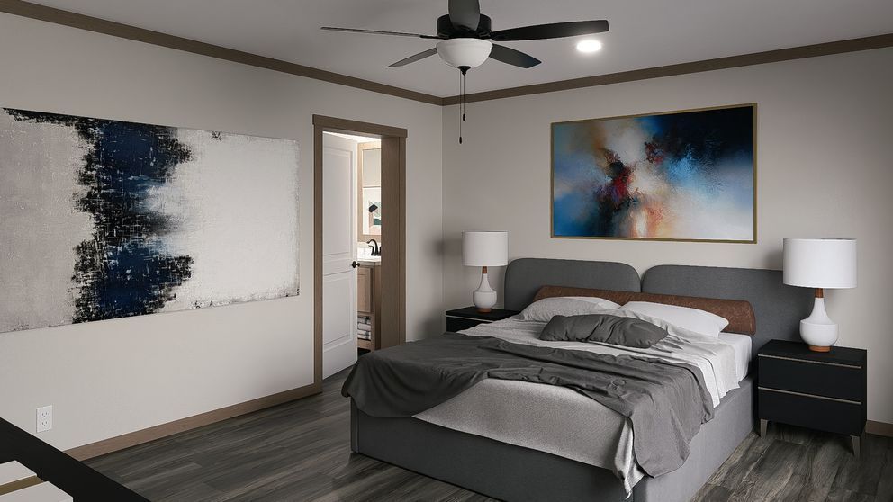 Modern bedroom with a gray bed, abstract wall art, nightstands, and ceiling fan