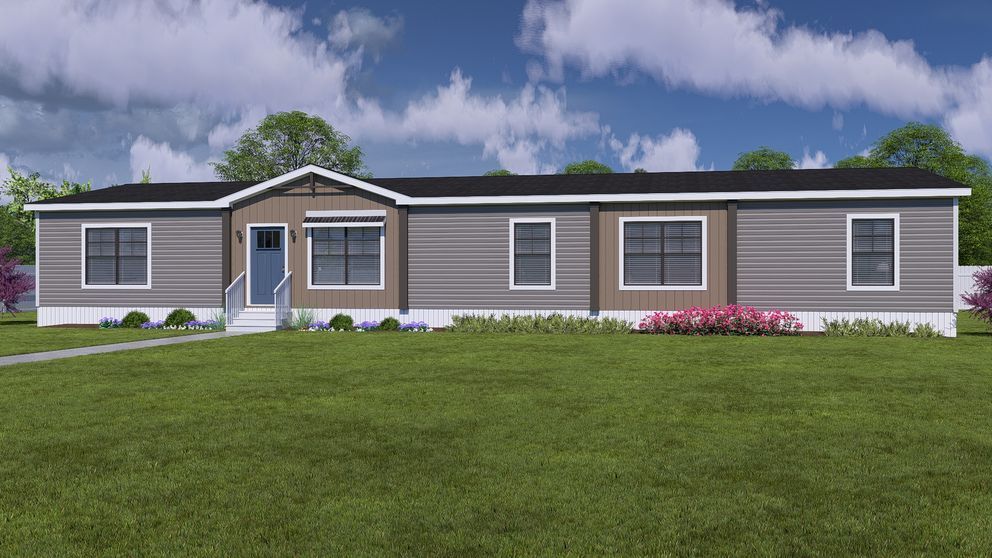 Single-story gray house with white trim, front porch, and a green lawn under a blue sky.