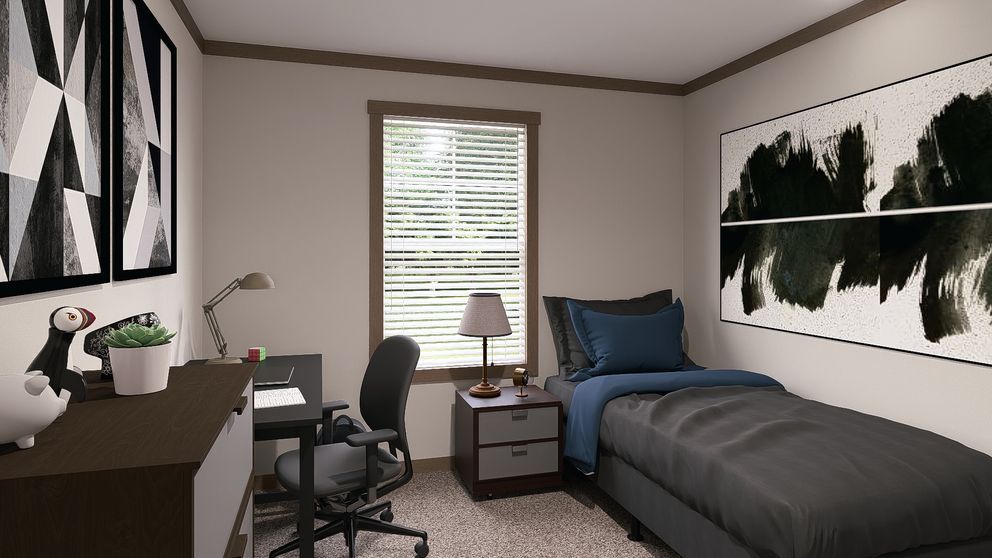 Small modern bedroom with desk, chair, bed, window, and black-and-white wall art.