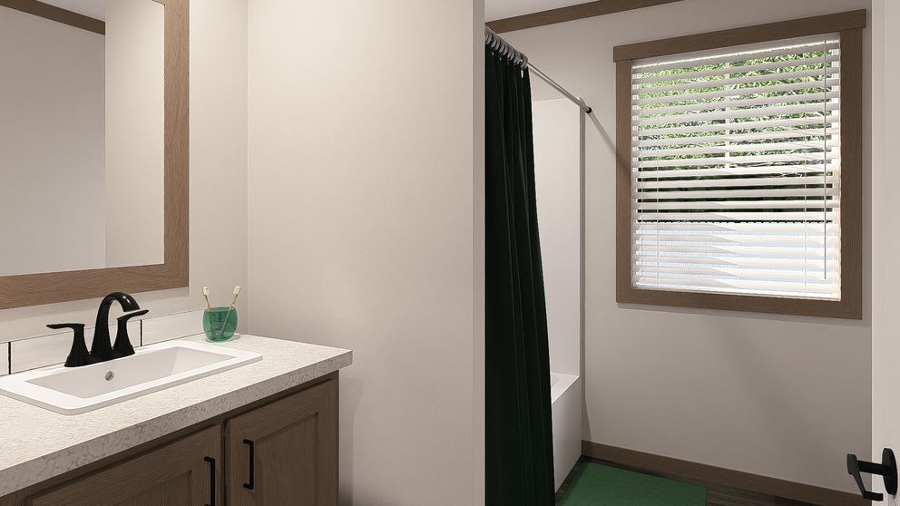Bathroom vanity with sink and mirror beside a shower curtain and window blinds