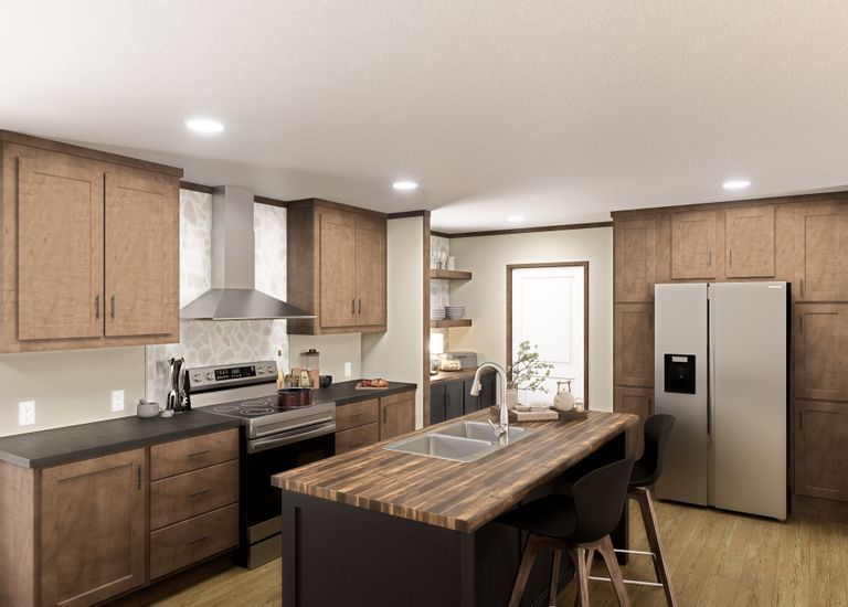 Modern kitchen with wood cabinets, stainless appliances, and a large island with stools