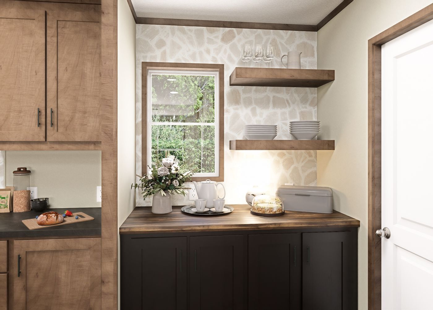 Bright kitchen nook with dark cabinets, wood shelves, window, and white door