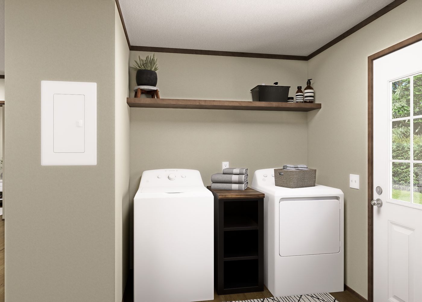 Laundry room with washer and dryer, dark shelf, and door to the outside