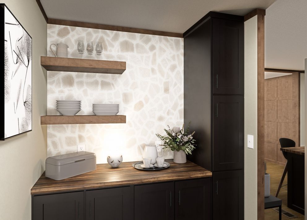 Modern kitchen nook with dark cabinets, wood shelves, stone-pattern wall, and tableware display