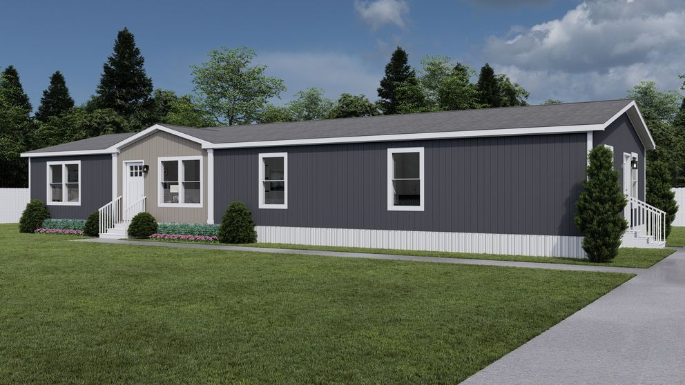 Gray single-story manufactured home with white trim, front porch, and a green lawn under a cloudy sky