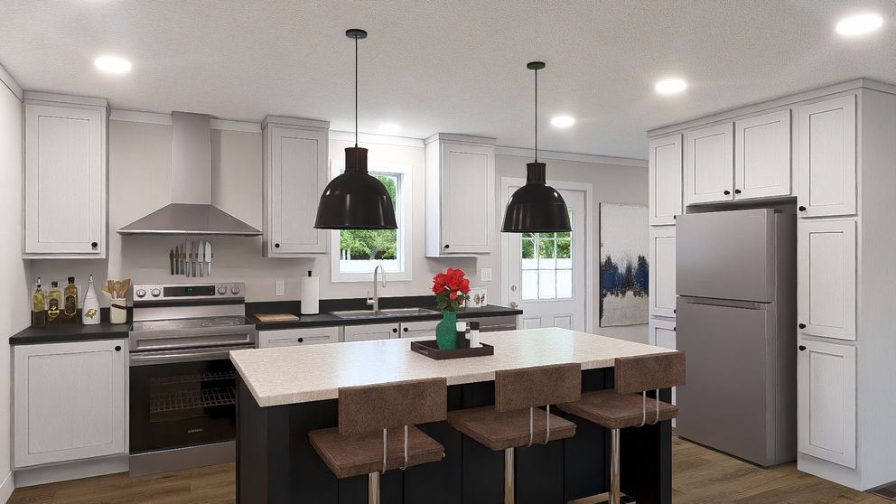 Modern white kitchen with island, black pendant lights, stainless appliances, and wooden bar stools