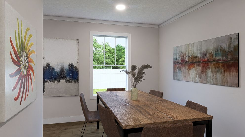 Minimal dining room with wooden table, chairs, abstract wall art, and a window letting in daylight
