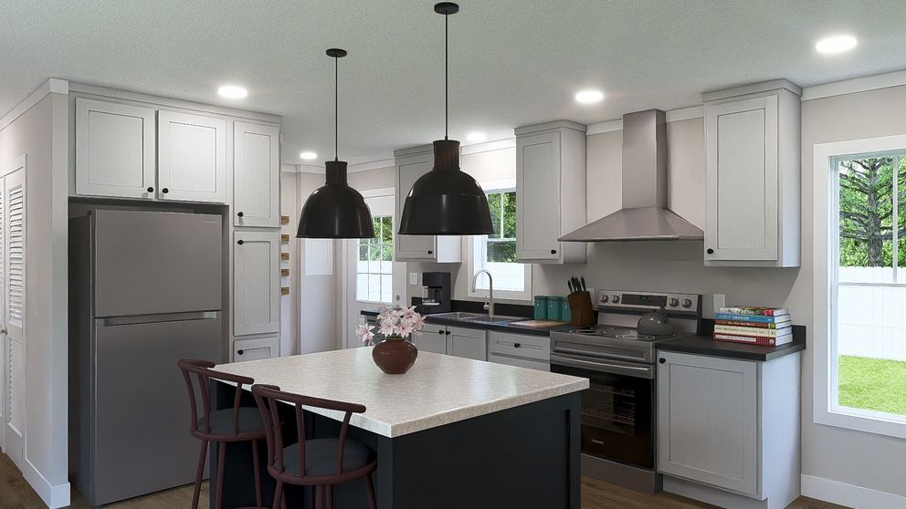 Modern kitchen with white cabinets, black island, pendant lights, and stainless steel appliances