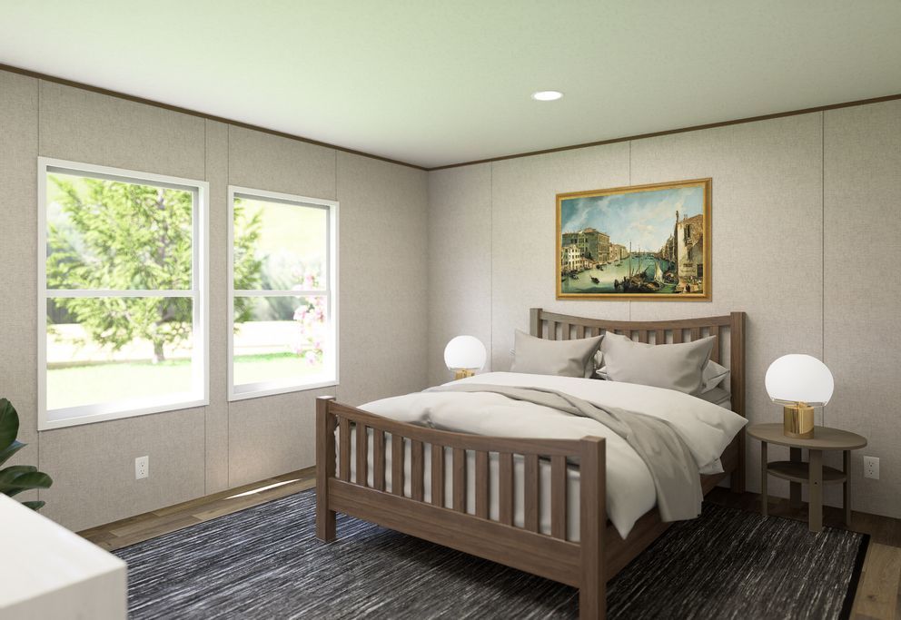 Bright bedroom with a wooden bed, two windows, bedside lamps, and landscape painting