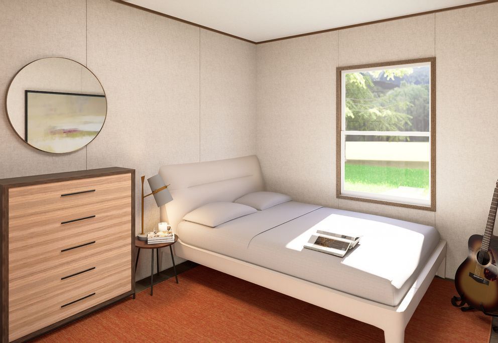 Minimal bedroom with bed, dresser, round mirror, window, and guitar by the wall.